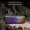 boAt Stone 580 portable Bluetooth speaker in Pine Green, on rocks with its carry strap, 12W stereo sound