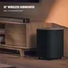 JBL Bar 500MK2 soundbar with wireless subwoofer in Black, wireless subwoofer beside a TV cabinet