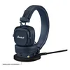 Marshall Major V wireless on-ear headphones in Midnight Blue, on a wireless charging pad