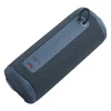 JBL Grip portable Bluetooth speaker in Blue, lying on its side, back panel with USB-C port