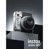 Fujifilm Instax Mini 99 Premium Edition Pack, Silver, camera on a display stand, front three-quarter view