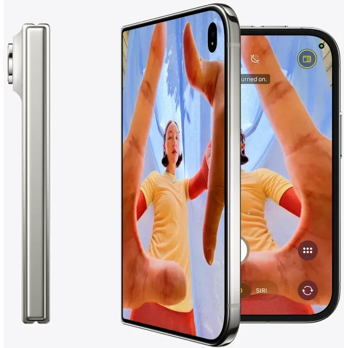 Apple iPhone Duo in Star White, closed, side profile next to the outer display with the Camera app open