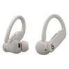 Beats Powerbeats Pro 2 true wireless earbuds in Quick Sand, front and back views of the earbuds