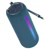 boAt Stone Spinx Pro portable Bluetooth speaker in Tropical Blue, angled view with the RGB strip lit and the carry strap