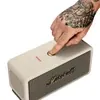 Marshall Middleton portable Bluetooth speaker in Cream, pressing the control knob