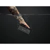 Marshall Emberton II portable Bluetooth speaker in Black and Steel, held under water