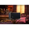 JBL Authentics 200 smart home speaker in Black, on a glass table in a living room