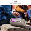 boAt Stone Nyx portable Bluetooth speaker in Desert Beige, lying on its side outdoors