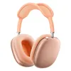 Apple AirPods Max (USB-C) in Orange, angled view showing the ear cushions