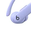 Beats Powerbeats Pro 2 true wireless earbuds in Hyper Purple, close-up of the ear hook and b button