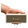 Marshall Emberton III portable Bluetooth speaker in Cream, held in one hand