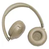 JBL Tune 680NC wireless on-ear noise cancelling headphones in Beige, one ear cup turned to show the ear cushion
