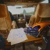 Marshall Emberton III Hendrix Edition portable Bluetooth speaker in Purple and Black, placed on a table in a camper van