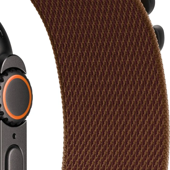 Apple Watch Ultra 4 in Black Titanium with the Burgundy Alpine Loop, close-up of the Digital Crown, side button and woven strap