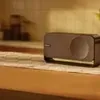 Bose SoundLink Home Bluetooth speaker in Warm Wood, on a kitchen counter