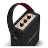 Marshall Stockwell III portable Bluetooth speaker in Black and Brass, angled close-up of the brass knobs and strap