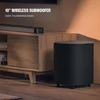JBL Bar 500MK2 soundbar with wireless subwoofer in Black, wireless subwoofer beside a TV cabinet