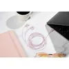 Sennheiser CX 80U USB-C wired earphones in Sakura, plugged into a laptop on a desk