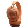 JBL Live 780NC noise cancelling headphones in Orange, folded, side view of an ear cup