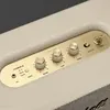 Marshall Stanmore III Bluetooth home speaker in Cream, brass control panel close-up