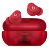 Beats Solo Buds true wireless earbuds in Transparent Red, earbuds above the open carrying case