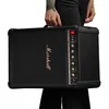Marshall Bromley 450 portable Bluetooth party speaker in Black and Brass, side view, carried by the built-in handle