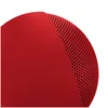 Beats Pill portable Bluetooth speaker in Statement Red, close-up of the end and metal grille