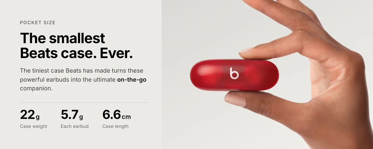 Hand holding the Beats Solo Buds case, the smallest Beats case, 22 g case and 5.7 g per earbud