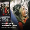 Marshall Milton A.N.C. wireless on-ear noise cancelling headphones in Black, worn on a train with ANC on
