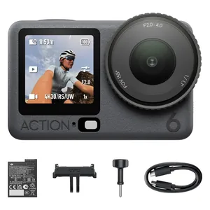 DJI Osmo Action 6 Standard Combo 8K Waterproof Action Camera, front view with the front screen on and the Standard Combo accessories