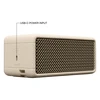 Marshall Emberton III portable Bluetooth speaker in Cream, side view with the USB-C charging port
