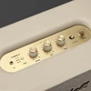 Marshall Stanmore III Bluetooth home speaker in Cream, brass control panel close-up