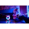 JBL PartyBox Encore 2 Bluetooth party speaker in Black, playing guitar through the speaker at home