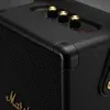 Marshall Tufton portable Bluetooth speaker in Black and Brass, close-up of the corner cap and metal grille