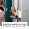 Amazon Echo Dot 5th Gen smart speaker in Black, on a hallway table