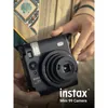 Fujifilm Instax Mini 99 Premium Edition Pack, Black, camera held in hand, front close-up