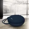 boAt Stone 193 portable Bluetooth speaker in Blue, on a desk with its lanyard