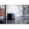 Bose Bass Module 500 wireless subwoofer in Black, on the floor of a living room