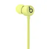 Beats Flex wireless neckband earphones in Yuzu Yellow, close-up of the earbud and ear tip