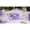JBL Live 780NC noise cancelling headphones in Purple, on its pouch on a desk