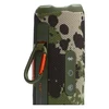 JBL Flip 7 portable Bluetooth speaker in Squad, carabiner on the PushLock mount beside the Bluetooth, power and Auracast buttons