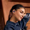 Sennheiser Momentum True Wireless 4 noise cancelling earbuds in Denim, worn in the ear