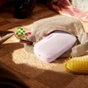 Bose SoundLink Flex (2nd Gen) portable Bluetooth speaker in Petal Pink, tucked into a tote bag