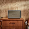Marshall Acton III Bluetooth home speaker in Midnight Blue, on a wooden sideboard