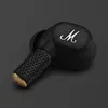 Marshall Motif II A.N.C. true wireless noise cancelling earbuds in Black, close-up of an earbud with its brass-coloured tip