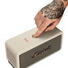 Marshall Middleton portable Bluetooth speaker in Cream, pressing the control knob