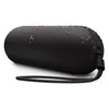 Beats Pill portable Bluetooth speaker in Matte Black, angled view with the lanyard attached and water drops