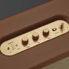 Marshall Woburn III Bluetooth home speaker in Brown, brass control panel close-up