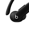 Beats Powerbeats Pro 2 true wireless earbuds in Jet Black, close-up of the ear hook and b button