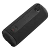 JBL Grip portable Bluetooth speaker in Black, lying on its side, back panel with USB-C port